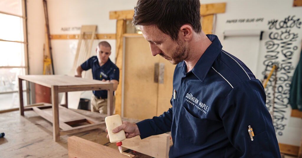 Worker in wood shop wearing the Pro Airflow work shirt