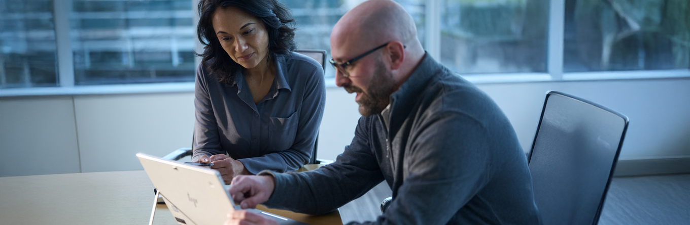 Image show a UniFirst uniform expert explain how to save to save on uniform program with reduced Total cost of ownership.