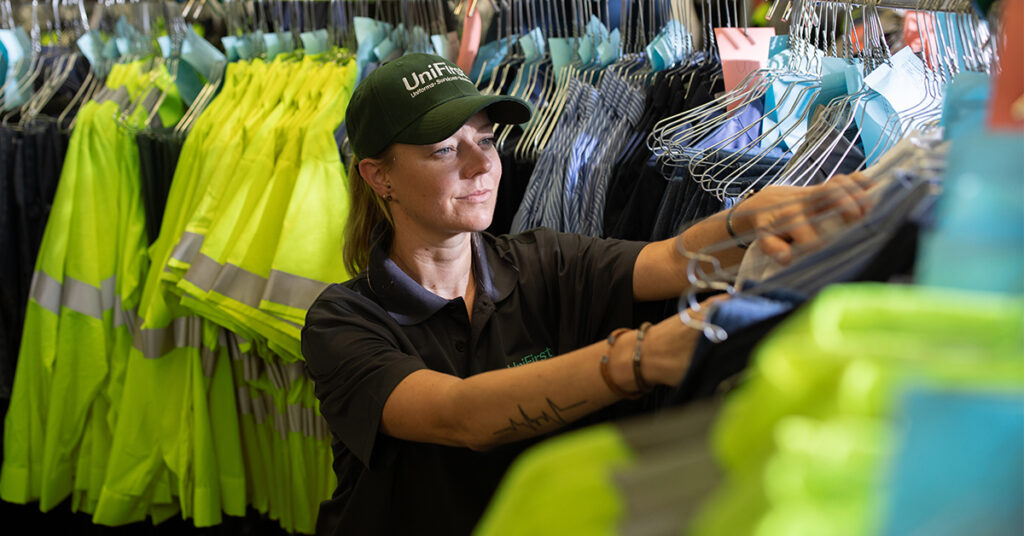 UniFirst worker helping keep your team safe, comfortable, and compliant in high visibility workwear