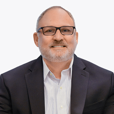 A portrait of David Katz, Executive Vice President of Sales and Marketing for UniFirst Corporation.