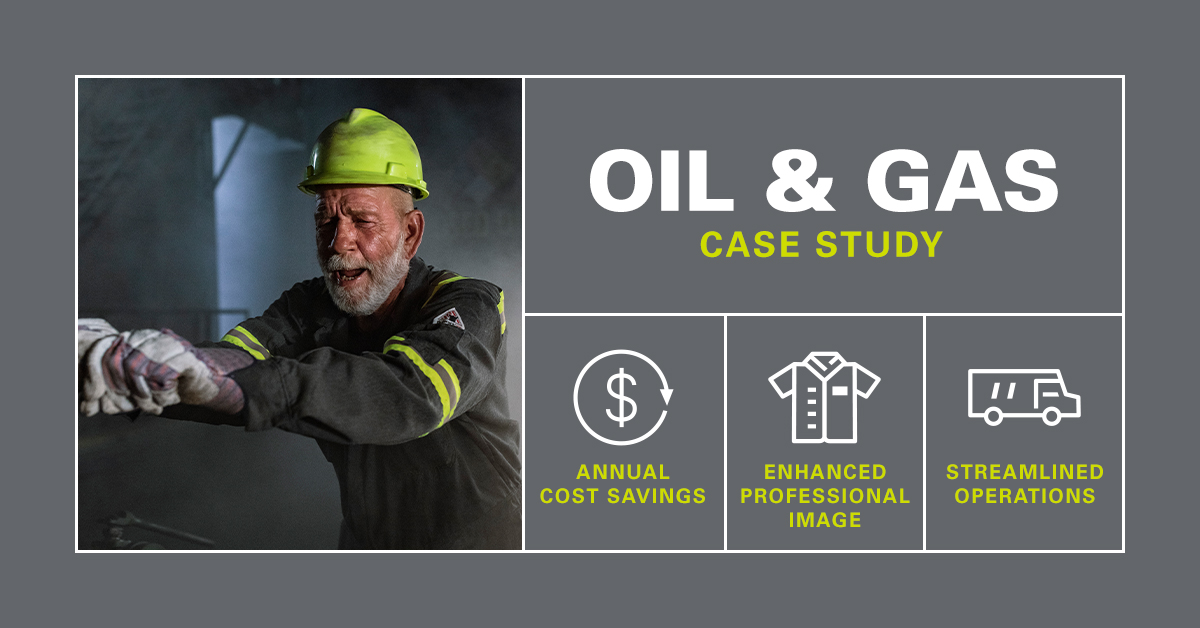 Man in the oil and gas industry using strength pushes a lever wearing UniFirst industrial workwear.