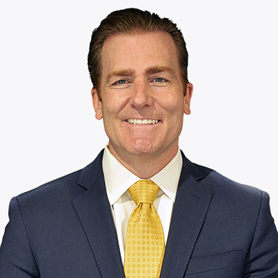 A portrait of Shane O'Connor, Executive Vice President and CFO at UniFirst