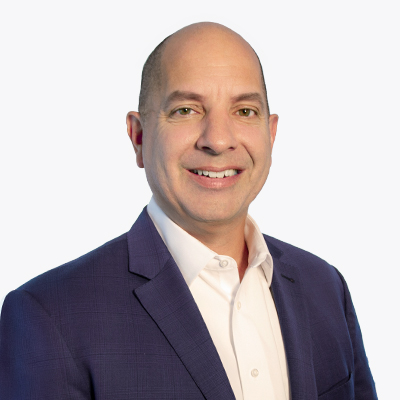 A portrait of Steven Sintros, President and CEO of UniFirst Corporation