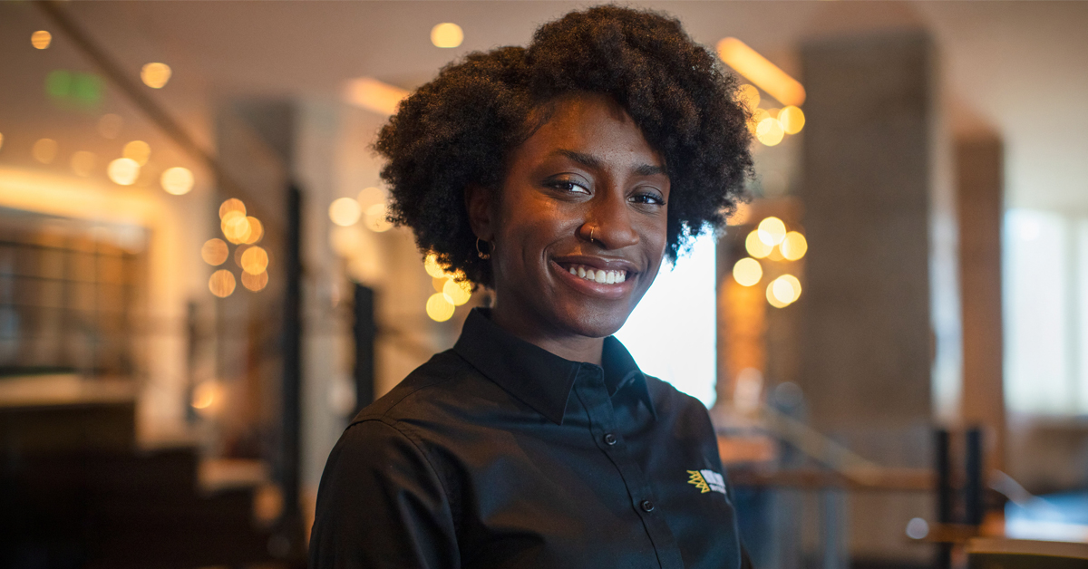 Woman Smiling wearing uniform